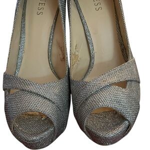 Guess size 10 silver metallic peep  toe platform pumps,timeless & super sexy